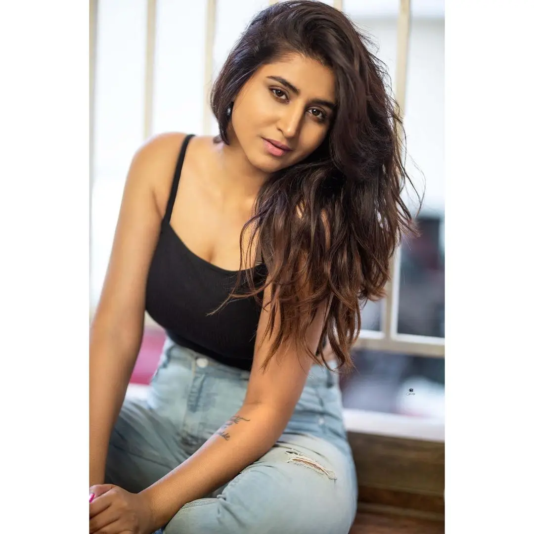 ETV Actress Varshini Sounderajan Stills in Black Top Blue Jeans